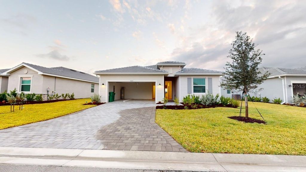 Photo of 7949 Lakes Edge Lane, Port Charlotte, FL 33981 (MLS # C7516516)
