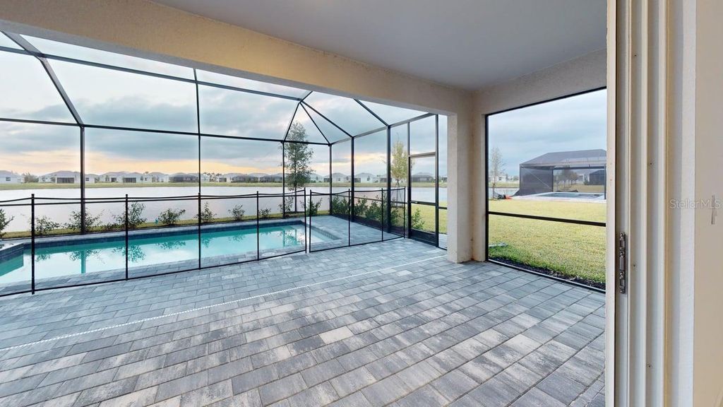 Photo of 7949 Lakes Edge Lane, Port Charlotte, FL 33981 (MLS # C7516516)