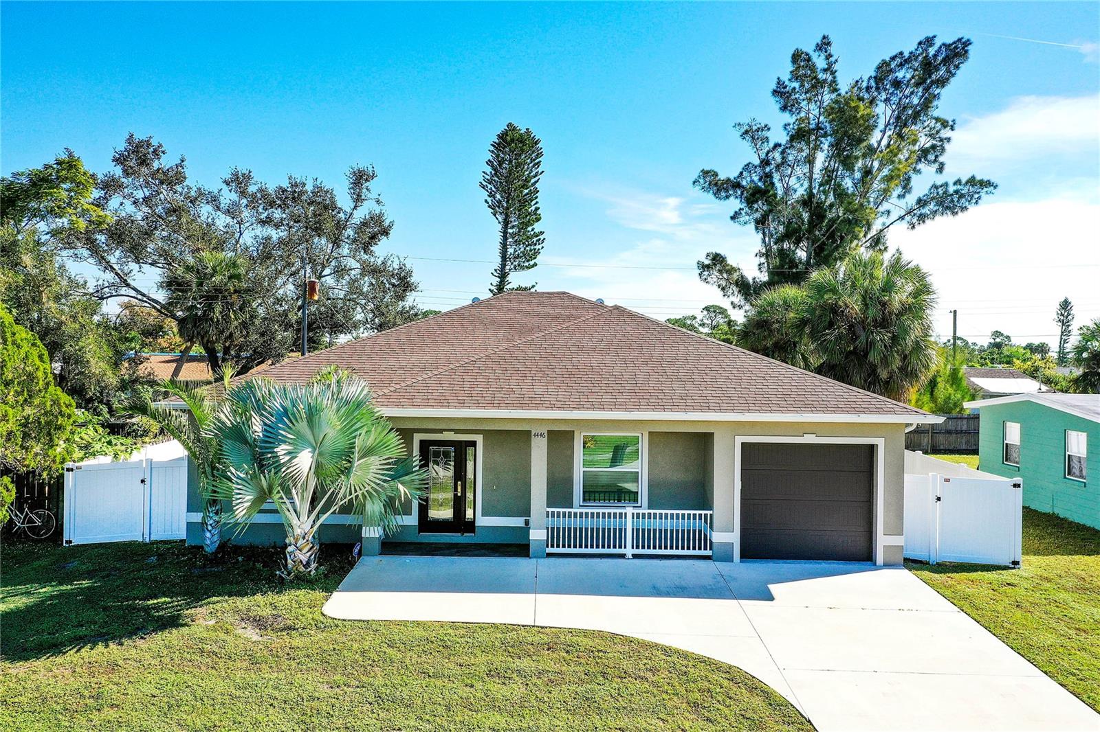 Welcome to Sunny South! This charming single-level home nestled in the heart of North Port, FL. Boasting three spacious bedrooms and two well-appointed bathrooms, this residence is thoughtfully designed for comfortable living. The home features a welcoming atmosphere with an open floor plan, allowing natural light to illuminate the space.
The coastal living room has two plush leather couches for you to kick back and relax after a day of adventure! The stunning stone wall has a Smart TV and is the focal point of this space. The kitchen has stainless-steel appliances for you to prepare your families favorite treats! There is also a breakfast bar with three barstools.
The primary bedroom has a set of doors leading to the backyard, and an attached bathroom, with a king-size bed. The primary bathroom is spa-inspired with a dual vanity and a walk-in shower that has breathtaking tile work. The second bedrooms offers a full-size bed with plenty of space for you to unwind, and has a closet with a dresser. The second bathroom has an updated vanity with a shower/tub combo. The third bedroom has two twin-size beds with a closet. All bedrooms boast a lovely coastal vibe, allowing you to truly relax in paradise.
The highlight of this property is its expansive gated backyard, providing both privacy and security. This outdoor oasis is perfect for entertaining friends, family gatherings, or simply enjoying the Florida sunshine in tranquility, creating a picturesque setting for relaxation.
Located in North Port, you'll enjoy the convenience of nearby amenities, parks, and a friendly community atmosphere. This home offers the perfect blend of modern comfort and the relaxed Florida lifestyle, making it an ideal home for those seeking both comfort and convenience!
House Rule: No smoking. No burning candles inside of lodging. No parties. No pets.
**Taxes and fees not included.