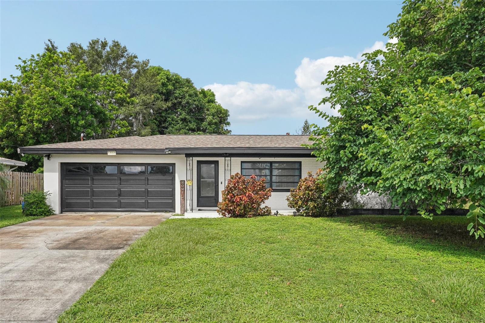 Stop the car! Don’t miss this move-in ready home— all the hard work has been done for you! Whether you’re looking for a primary residence, vacation home, or investment property, this is a turnkey opportunity in a prime Clearwater location. The interior has been completely renovated throughout with updated finishes and modern flooring that even extends out to the porch for a seamless flow. The open floorplan is ideal for entertaining or ease of everyday living presenting a brand new kitchen featuring granite countertops, stainless steel appliances, modern cabinetry and stylish backsplash. The bathrooms are also updated with contemporary fixtures and designer tile work. The backyard is so spacious enough for a pool or just whatever your imagination can plan! Not only is this home beautiful but practical too with energy efficient lighting, Roof 2019, HVAC 2017, Attic Fan to reduce heat, well-water for irrigation so no water bill for lawn maintenance. Ideally located near Eagle Lake Park, Highland Recreation Complex, Indian Rocks Beach, world-famous Clearwater Beach, The Baycare Sound concert center at Coachman Park and Downtown Clearwater. Surrounded by parks, shopping, dining, and top-rated schools this is your Home Sweet Home!
