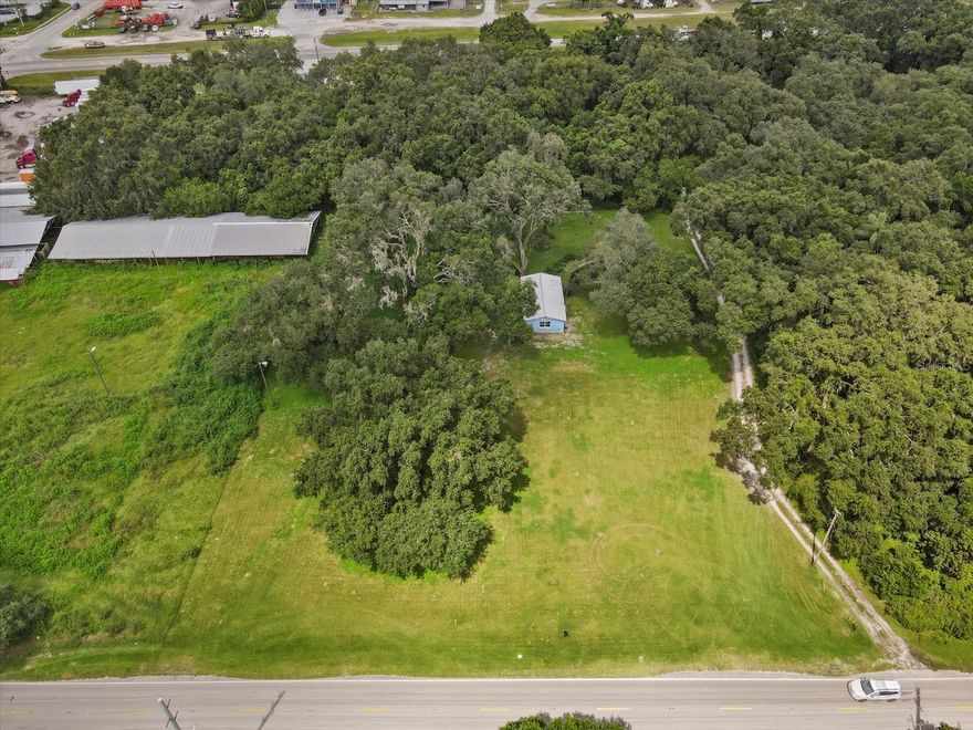 350.000 or best offer! SO MUCH POTENTIAL! Approximately 6-7 minutes from EITHER I 75 Fowler Ave Exit OR I 4 at I 75 Junction AND US Hwy 301!!  This 1.71 Acre CLEARED parcel. Total Land Area: 1.71 acres / 74,488 sf Land Zoning: AR/AR - AGRICULTURAL. 240 ft OF ROAD FRONTAGE! Depth: 310 ft. MUCH COMMERCIAL ACCROSS THE STREET and surrounding areas. Reasonable due diligence period may be accepted with serious offer. 1011 sf block structure that was a house built in 1961 now gutted. POSSIBLY MAY be structurally sound but guaranteed or warranted by seller.  Newer windows. HAS ELECTRIC POLE but meter removed by TECO. Working well HAS ALL NEW WELL EQUIPMENT. Septic connected but septic tank removed and filled in. PUBLIC WATER AND NATURAL GAS AVAILABLE AT STREET IN FRONT. All property lines shown in photos are general and NOT actual lines. SURVEY attached. SO MUCH DEVELOPMENT NEARBY! NEW RESIDENTIAL COMMUNITIES ADDED ALL AROUND AND NEAR THIS AREA.