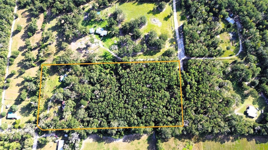Photo of 1874 SW Nautilus Road, Lake City, FL 32024 (MLS # O6451097)