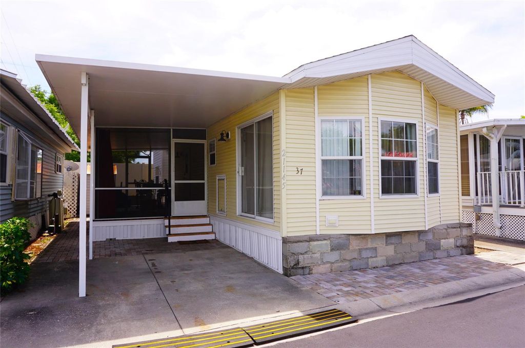 Photo of 21145 Lazy Days Circle, Lutz, FL 33558 (MLS # W7884782)