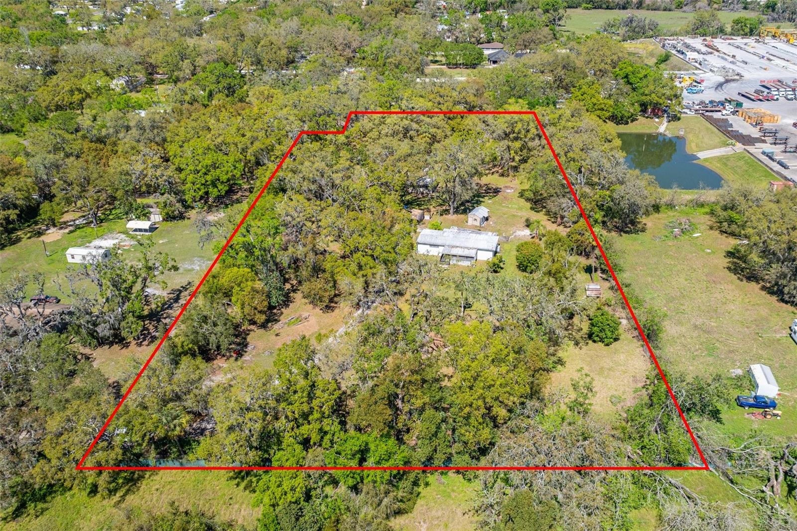 Prime opportunity to own 3.98 acres of land zoned AS-1, allowing for one single-family home per acre. With utilities already available, this property is ready for your next development or custom home project. Whether you're envisioning a private estate or planning to build multiple residences, this expansive lot offers flexibility, space, and future potential. Nestled in a growing area with a blend of rural charm and convenience—don't miss your chance to bring your vision to life!