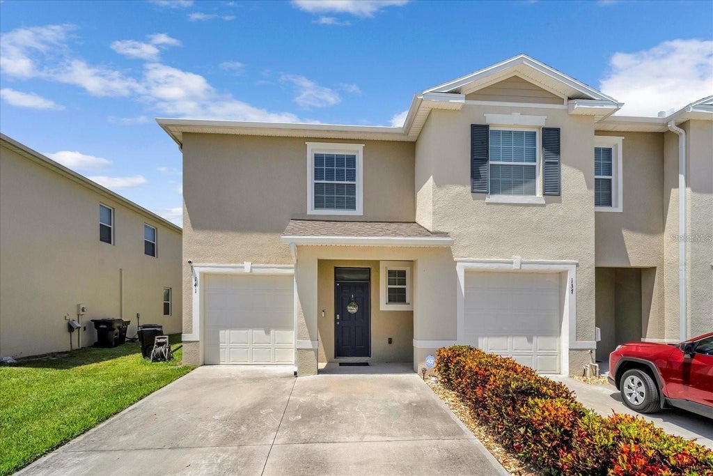 Photo of 141 Feltrim Reserve Boulevard, Davenport, FL 33837 (MLS # O6414336)