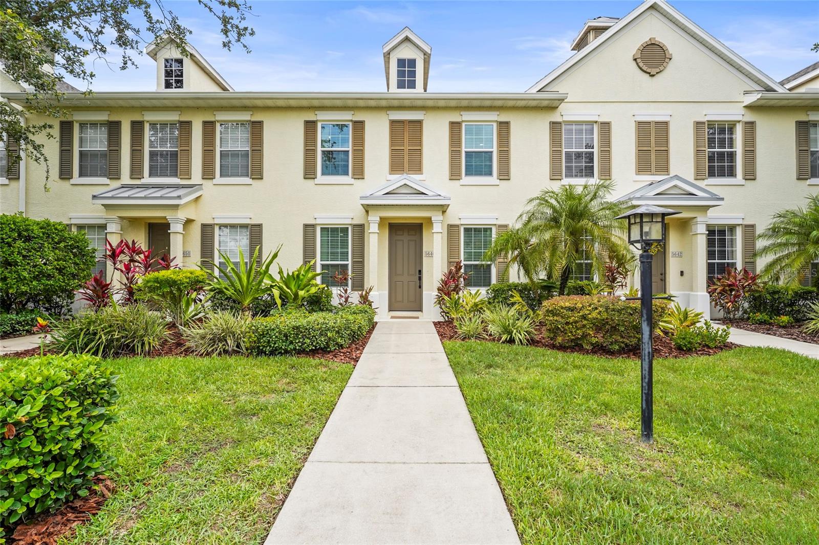 Welcome to HARBORAGE ON BRADEN RIVER, a sought-after riverfront community offering a gated, maintenance-free lifestyle surrounded by natural beauty and resort-style amenities. This beautifully appointed two-story townhouse was fully remodeled and features 3 bedrooms, 2.5 bathrooms, and a versatile den/formal dining area featuring a new roof and hurricane impact windows and doors!
Step inside to tall ceilings and luxury vinyl flooring throughout. The spacious kitchen is a chef’s dream, showcasing quartz countertops, a dramatic waterfall island with breakfast bar, stainless steel appliances and generous pantry storage. The kitchen opens seamlessly to the family room, perfect for entertaining.
The primary suite is located upstairs and offers a peaceful retreat with tray ceilings, an accent wall, double vanities, and a walk-in shower. Two additional bedrooms share a full bath with stylish finishes. A half bath is conveniently located on the main floor.
Enjoy outdoor living in your private, fenced courtyard space. The 2-car garage is air-conditioned and includes built-in storage, shelving, and epoxy flooring as well as an EV charger!
Community amenities include a clubhouse, heated resort-style pool and spa, 24-hour fitness center, canoe/kayak launch, scenic nature trails, elevated boardwalks, a riverfront gazebo, picnic areas, and a fishing pier. For boating enthusiasts, the community also offers a marina where there are currently three boat lifts available for lease at an incredibly affordable rate of just $100 per month!
Experience the best of Florida living in this move-in-ready home in a truly special community.