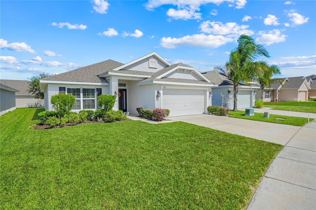 Photo of 491 Meadow Pointe Drive, Haines City, FL 33844 (MLS # O6451652)