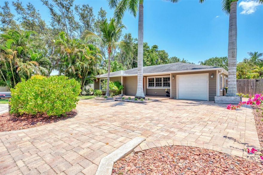 AVAILABLE MARCH 1ST - Is this contemporary gem located West of the Trail in vibrant Sarasota, FL. This spacious home offers a seamless blend of modern design and cozy charm, featuring an open floor plan that is perfect for both entertaining and everyday living. Step inside to discover a beautifully appointed chef's kitchen, complete with solid wood cabinets, sleek granite countertops, and high-end stainless steel appliances. A convenient eating space in the kitchen invites gatherings and casual meals alike. The home boasts three generously sized bedrooms, each with its own en-suite bathroom, offering privacy and convenience for all residents. The expansive lot is a true highlight, with an oversized backyard featuring garden beds and ample private outdoor space, perfect for gardening enthusiasts or those who love to relax in a serene setting. Parking is a breeze with both a garage and driveway. This pet-friendly haven is ideally situated close to Downtown Sarasota, Southside Village, and numerous beautiful beaches such as Siesta Key and Lido Beach. Also this is in the Southside Elementary school district. Enjoy easy access to shopping, dining, and entertainment options, as well as a unique easement providing convenient access to Sarasota Memorial Hospital. Don’t miss your chance to make this your home.