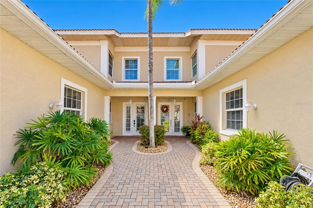 Photo of 197 Tarpon Cove Boulevard #611, Punta Gorda, FL 33950 (MLS # C7531943)