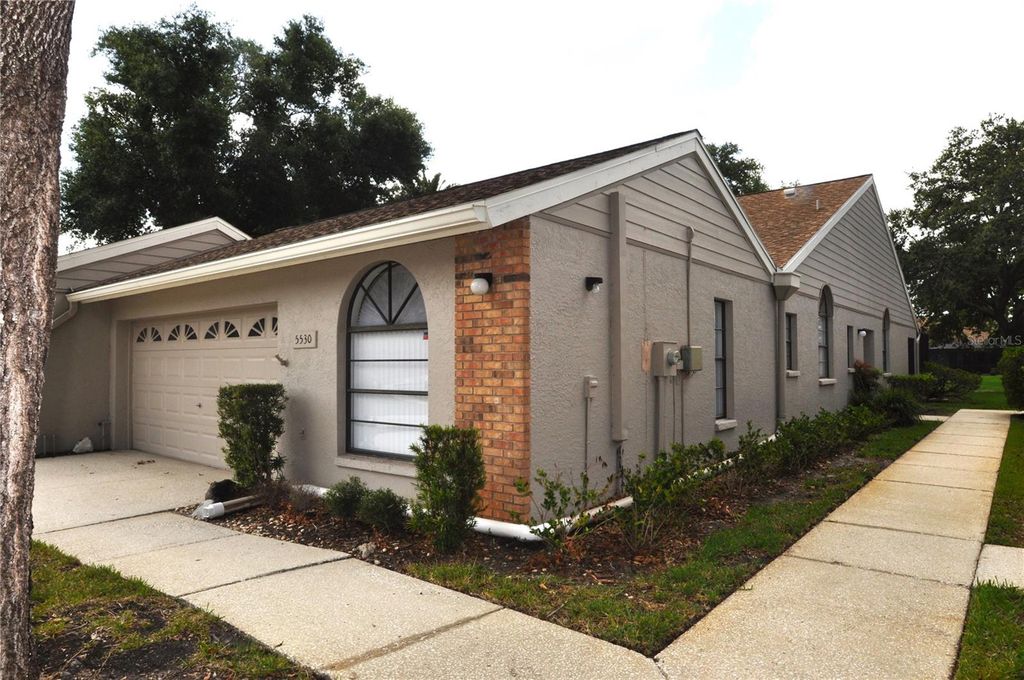 Photo of 5530 Salem Square Drive N, Palm Harbor, FL 34685 (MLS # TB8394314)