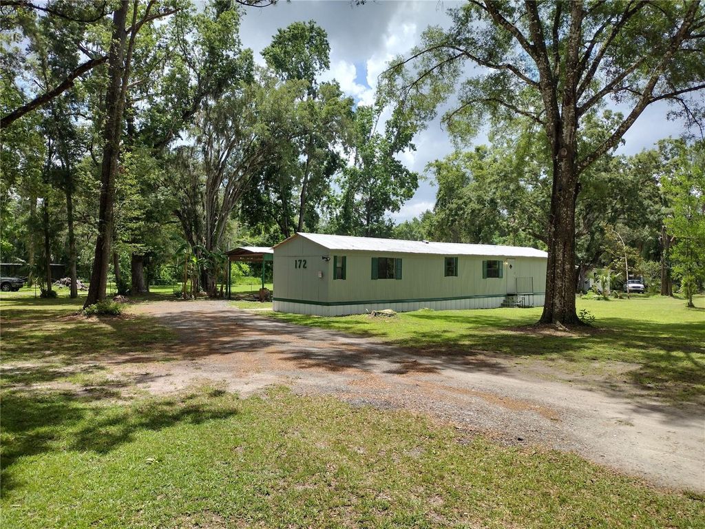 Photo of 172 Estates Avenue, Brooksville, FL 34601 (MLS # W7876019)