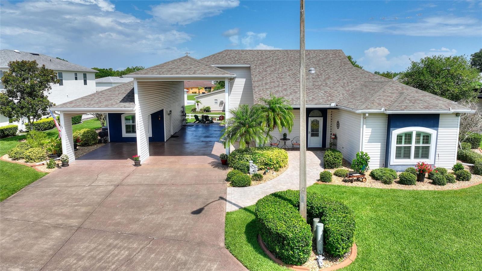 Nestled on a spacious 15,198 sq ft double lot, this beautifully updated 2 bed, 3 full bath home offers 2,134 sq ft of thoughtful design and comfort. Boasting all-new windows and front storm door (2024), a full-house propane generator (2022), and smart upgrades like a 2025 irrigation control box, this home blends modern convenience with peaceful Florida retirement living. The open floor plan includes a Florida room, screened lanai, and upstairs loft, ideal for flexible living. Enjoy a luxurious primary suite with walk-in shower, spa tub, dual vanities, and walk-in closets. Additional features include an In-Law suite, updated kitchen with new refrigerator (2024), laundry room with sink, whole-house TV antenna (2024), and lush landscaping. Located in an age-restricted community with two clubhouses, two pools, fitness centers, a movie theater, and more. There is a 55x15.5 RV port with full hookups, and a 22x13 carport.
PRICE JUST REDUCED AND HOME WARRANTY ADDED FOR TWO YEARS $1700.00 VALUE!