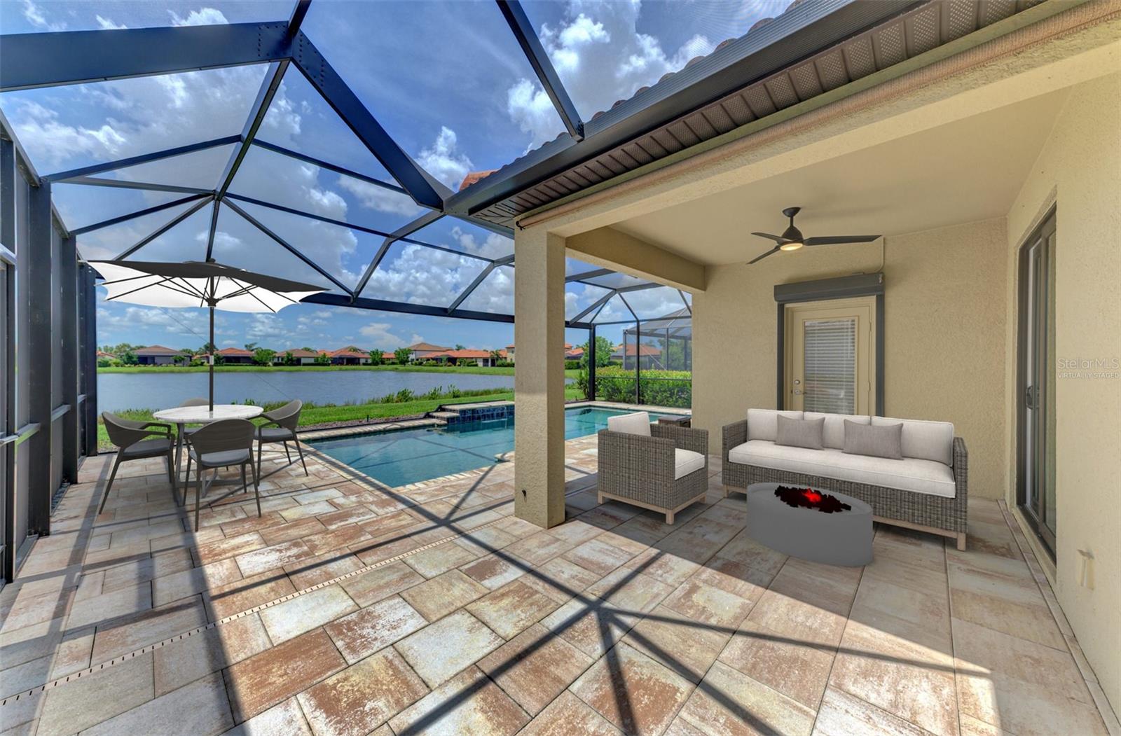 One or more photo(s) has been virtually staged. Priced to Sell! Plus Peace of Mind Included –HOME WARRANTY with Purchase! Welcome to this MOVE-IN READY, 3-Bedroom, 2-Bathroom POOL HOME with WATER VIEW, IMPACT WINDOWS and SLIDING Glass Doors, Motorized Hurricane Shutters for Front Door and Pool Bath, operable via remote command or from an app on your cell phone. Home is located in X Zone, so lenders will NOT require flood insurance. RARE-ONLY plan in the community with a POOL BATH. This desirable Maintenance-Free community is close to everything, with LOW HOA FEES and NO CDD FEES. Enjoy the Florida Lifestyle year round with an elegant SALT WATER Custom Pool overlooking a Serene Pond, enclosed by a CLEAR-VIEW screen. The Pool features both a HEATER for cool evenings and a CHILLER for hot summer days. A sunshade on the lanai creates the perfect retreat for relaxing or entertaining. The Open Floor Plan is enhanced by a Cathedral-Like Foyer, High Ceilings, Crown Molding, and Ceramic tile laid on the diagonal. Designer Curtains and Valances add an elegant touch, while MINKA AIRE ceiling fans throughout provide additional comfort. The Kitchen boasts granite countertops, upper cabinets with crown, pull-out drawers, stainless steel appliances plus a Wine Refrigerator. The Primary en suite is of ample size with walk-in closet, dual sinks, a soaking tub, separate shower and private water closet. On the opposite side of the home are two bedrooms which share a large guest bath (Pool Bath) with a shower-tub combo offering easy access to the pool area. Both bathrooms are designed with comfort in mind, featuring Luxury Height toilets, while the Laundry Room offers extra storage with Custom Cabinetry. Additional Exterior features include Gutters all around, Custom Curbing, and a Screened Front Entry. Watercrest is a Gated community with a State of the Art Fitness Center, Resort Style Pool and Bocce Ball. Excellent location, less than 5 miles to Downtown Venice, Dining, Shopping, Beaches, Legacy Trail, and Venice Theater. Close proximity to Grocery Stores, Medical Offices, and the new Sarasota Memorial Hospital. This stylish home embodies quality, value and ease of living. Don't miss this opportunity to make this exceptional property your own-schedule your showing today!