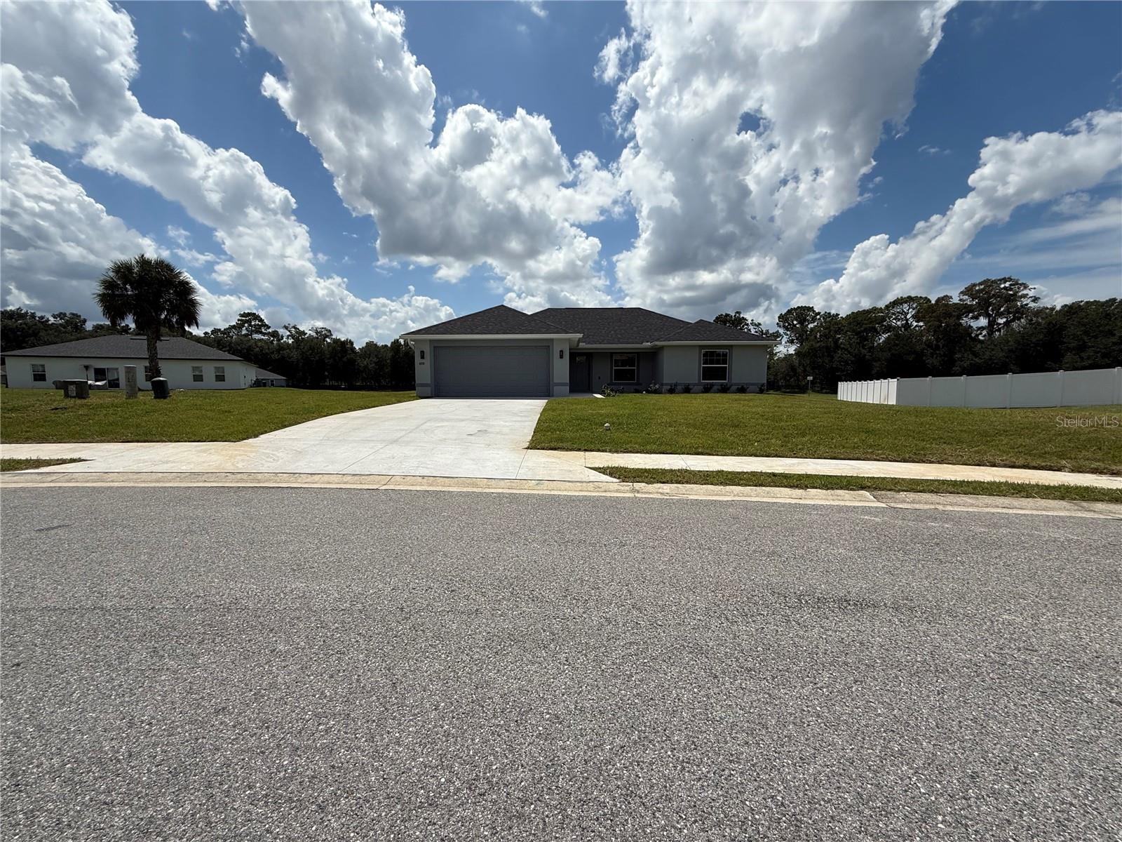 Access to your New Beautiful 4 Bedroom and 2 Bath Home in St. James Park requires a gate code for entry, ensuring privacy and security for residents. Homes here feature low HOA fees. Many upgrades include: Stone counters, Luxury Vinyl Plank flooring throughout, ceiling fans, stainless steel appliances, and versatile island with breakfast bar. Master suite offers double vanity sink, tub, walk-in shower, private toilet room and walk-in closet. Block and stucco exterior, two car garage with automatic garage door opener and irrigations system. Conveniently located to shopping, medical facilities, anything nature and restaurants. Peaceful and private living environment. Make your appointment today. If you're ready to MOVE this is the one. St. James Park in Ocala is a desirable place to live due to its combination of luxury, security, and community amenities, all within a serene, park-like setting. The gated community offers privacy, beautifully landscaped streets, and green spaces for recreation, while its location provides convenient access to top-rated schools, shopping, dining, and outdoor activities like those in the nearby Ocala National Forest.