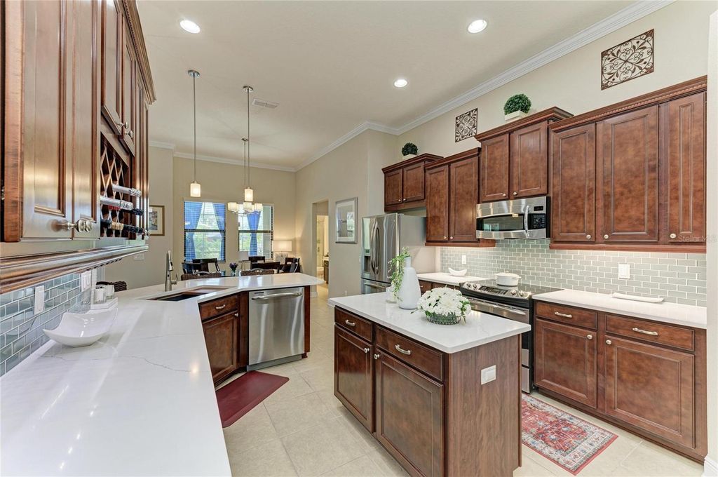 Photo of 302 Cockle Shell Loop, Apollo Beach, FL 33572 (MLS # A4684150)