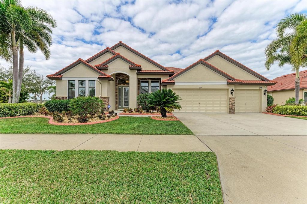 Photo of 302 Cockle Shell Loop, Apollo Beach, FL 33572 (MLS # A4684150)