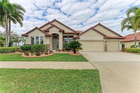 Photo of 302 Cockle Shell Loop, Apollo Beach, FL 33572 (MLS # A4684150)