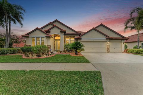 Photo of 302 Cockle Shell Loop, Apollo Beach, FL 33572 (MLS # A4684150)