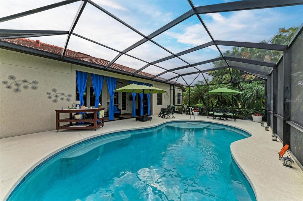 Photo of 302 Cockle Shell Loop, Apollo Beach, FL 33572 (MLS # A4684150)