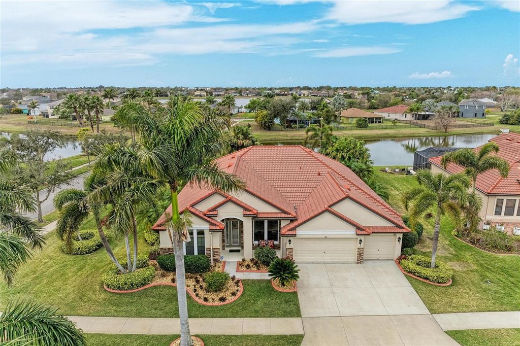 Photo of 302 Cockle Shell Loop, Apollo Beach, FL 33572 (MLS # A4684150)