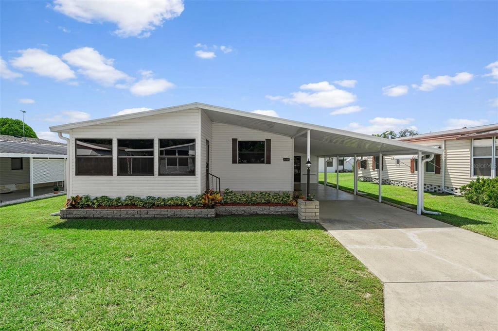 Photo of 35106 Mcculloughs Leap, Zephyrhills, FL 33541 (MLS # W7889589)