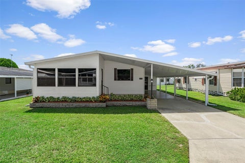 Photo of 35106 Mcculloughs Leap, Zephyrhills, FL 33541 (MLS # W7889589)