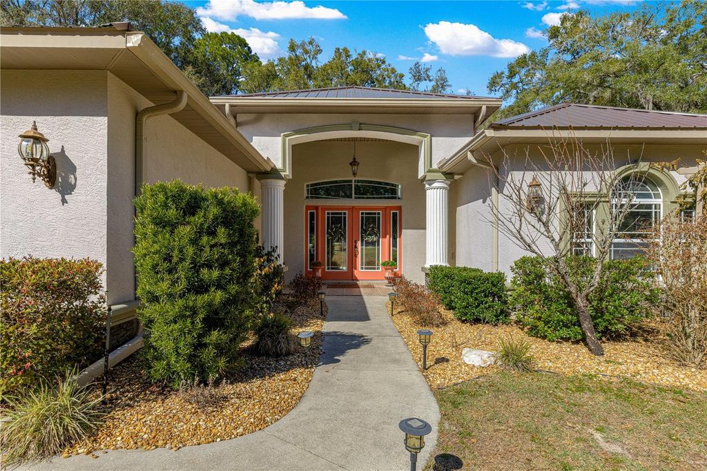 Photo of 10100 N Wayland Avenue, Citrus Springs, FL 34434 (MLS # OM718076)