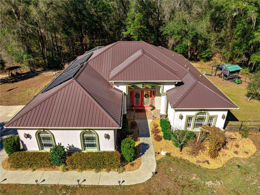 Photo of 10100 N Wayland Avenue, Citrus Springs, FL 34434 (MLS # OM718076)