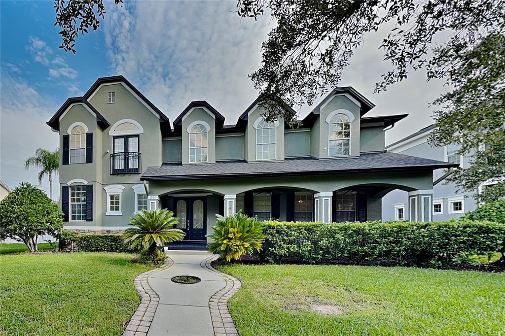 Photo of 3930 Cassia Drive #A, Orlando, FL 32828 (MLS # O6451714)