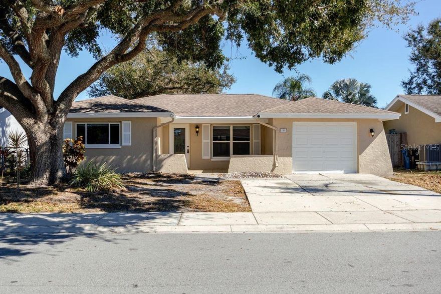 Welcome to this well-maintained 3-bedroom, 2-bath home offering 1,667 square feet of comfortable living space on a spacious 60x100 lot, located on a quiet street in desirable Oldsmar.

This home features newer appliances, a 2025 hot water heater, and a 2022 AC system, providing peace of mind for years to come. Inside, you’ll find new carpet in Bedrooms 2 and 3, along with a bright and functional layout that includes both a living room and family room with a wood-burning fireplace, perfect for relaxing or entertaining.

The kitchen is enhanced with a new slider and updated windows in the living room and family room, allowing for abundant natural light and easy access to the backyard. An inside laundry room adds everyday convenience.

Enjoy the tranquility of the neighborhood while having direct access to Harbor Palms Nature Park, offering walking and biking trails just steps away. Ideally located less than 20 minutes from Clearwater Beach, with nearby shopping, dining, and major roadways, this home delivers the perfect blend of comfort, location, and Florida lifestyle.

Schedule your private showing today—this Oldsmar opportunity won’t last!