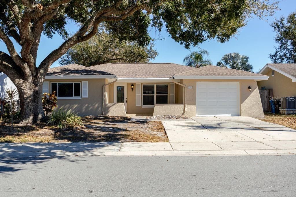 Photo of 709 Lemonwood Drive, Oldsmar, FL 34677 (MLS # TB8475735)