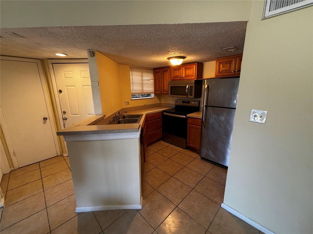 Photo of 1932 Lake Atriums Circle #80, Orlando, FL 32839 (MLS # O6375946)