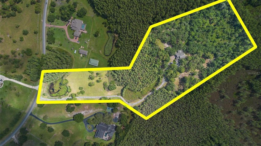 Photo of 11933 Pasco Trails Boulevard, Spring Hill, FL 34610 (MLS # V4943206)