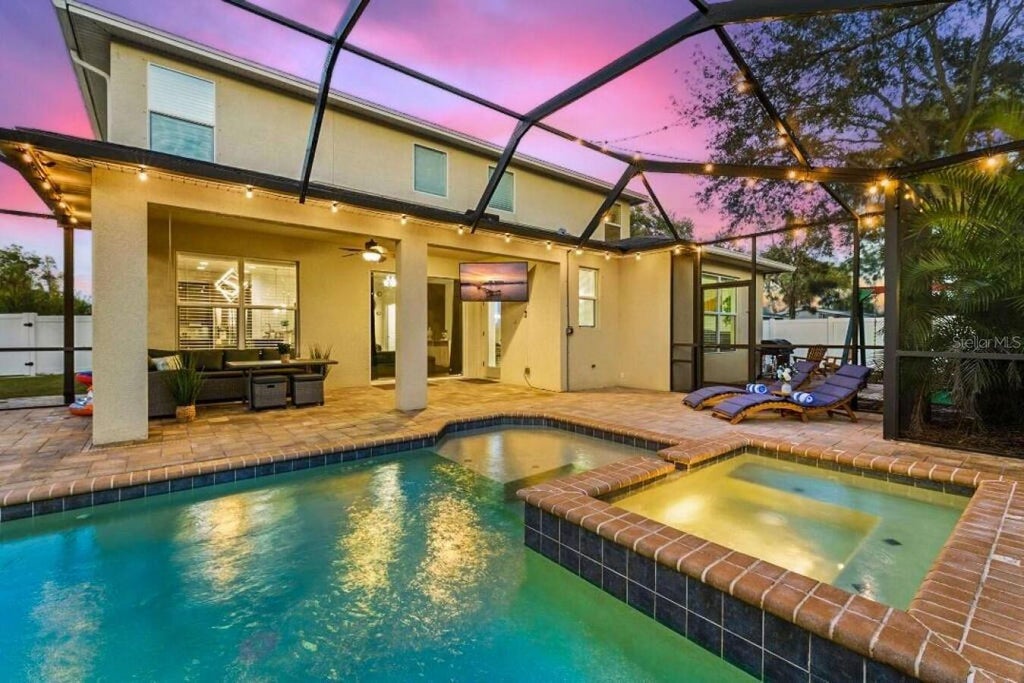 Photo of 2930 W Rogers Avenue, Tampa, FL 33611 (MLS # O6437348)