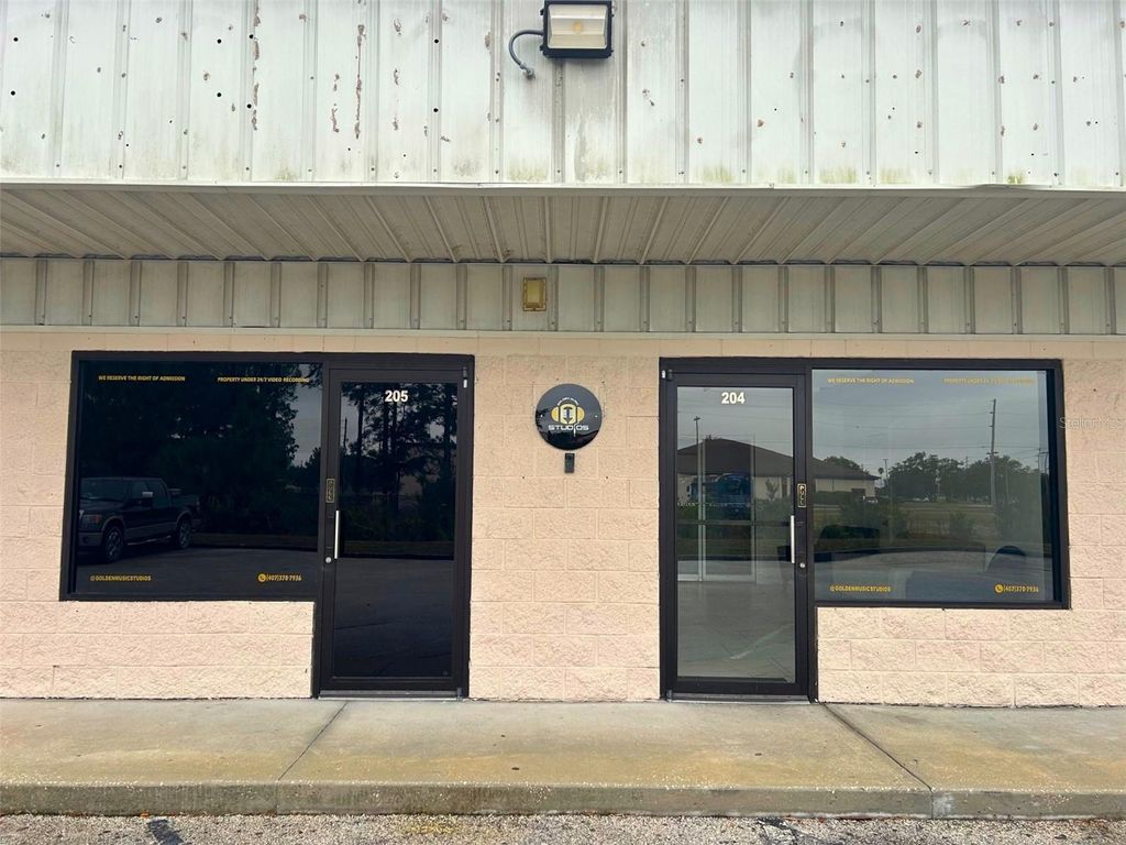 Photo of 11601 S Orange Blossom Trail #204, Orlando, FL 32837 (MLS # G5105334)