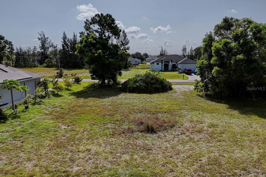 Photo of 3912 NE 9th Avenue, Cape Coral, FL 33909 (MLS # O6418754)