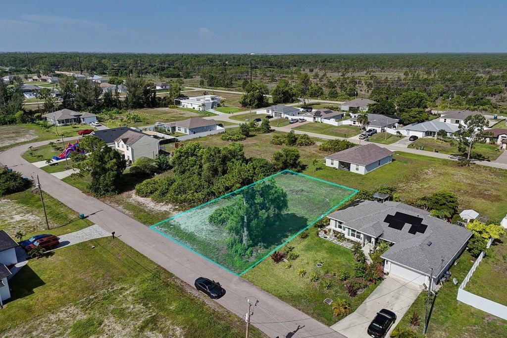 Photo of 3912 NE 9th Avenue, Cape Coral, FL 33909 (MLS # O6418754)