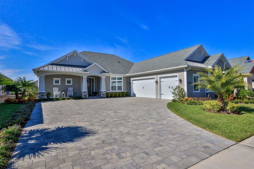 Stunning lakefront pool home in the prestigious Estates of Verano in the desired golf course community of Venetian Bay! Built by Platinum Builders in 2018, this model home features top of the line quality throughout & is surrounded by lush landscaping & attractive pavered driveway & lanai! Fabulous open floorplan has 12' coffered ceilings in the living areas bordered by attractive crown molding & gorgeous tiled flooring which looks like wood throughout the home. Spectacular views of the pool & lake from the moment you open the front door of this home situated on a premium lakefront lot. The Cottage model features a 3 bedroom, 2 bath, 3 car garage with over 2400 feet of living area plus an expansive pavered lanai with a new screened saltwater heated pool & spa! Attractive plantation shutters & remote controlled shades provide privacy on all windows. Built in fireplace in the Living Room is remote controlled & can be set to change colors if desired. Whole house generator with underground propane tank on south side. Charming barn style door opens to the huge utility room which has lots of cabinets, utility sink & 2 pantries. Enjoy the Florida lifestyle today in this immaculate better than new home. Venetian Bay offers an 18 home golf course, captivating clubhouse, town center with fitness center, deli & restaurants, lots of sidewalks for walking & bike riding. All of this only 15 minutes to the beach & a few minutes to I-95, I-4, Port Orange & charming historic New Smyrna Beach! ;Water: City