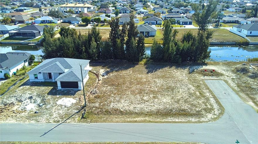 Oversized waterfront lot on Hermosa Canal! This 0.27-acre property features an impressive 115 feet of canal frontage and is located on a quiet dead-end street, offering added privacy and minimal traffic. Ideally situated near entertainment, restaurants, and shopping, this location provides both convenience and coastal access. Located in a NON-flood zone, this lot is ideal for building a custom single-family residence with generous space for a pool, extended lanai, or outdoor living areas. The property is set within an established neighborhood, making it an excellent opportunity for builders, investors, or buyers looking to create a personalized waterfront retreat. Start living your Southwest Florida life today!