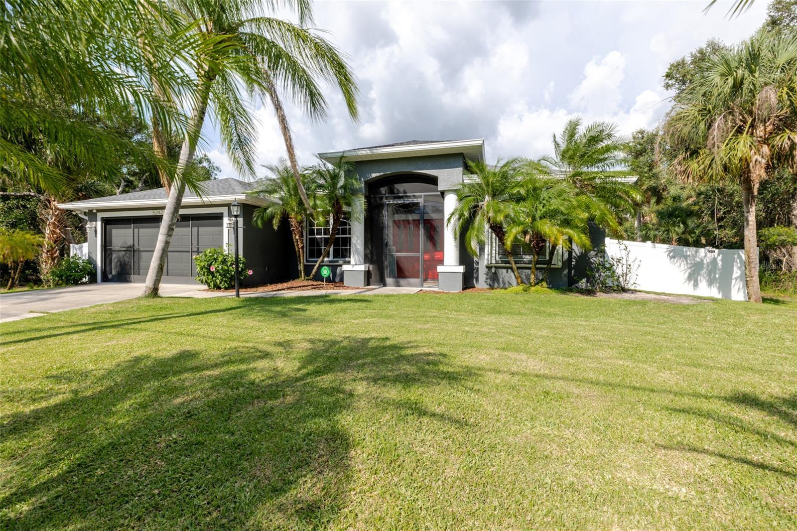 Welcome to your stunning, updated Florida oasis! This spacious 3-bedroom, 2-bathroom pool home is meticulously maintained, super clean, and bathed in natural light. Recently refreshed with new exterior paint, its curb appeal is undeniable.
Step inside through double front doors to an open living/dining area, seamlessly flowing into the kitchen and family room. The beautiful kitchen boasts stainless steel appliances and a high bar, perfect for entertaining. The master suite is a true retreat with two walk-in closets and direct access to the sparkling pool area. Its luxurious en-suite features a walk-in shower, jetted tub, and double sinks.
Enjoy the best of indoor-outdoor living with a spacious, covered, screened-in porch and a private pool, complete with a pool safety fence. The backyard offers enhanced privacy and charm with new vinyl fencing. Practical upgrades abound, including a new roof (July 2023), new hot water heater, whole-house water purifier, and an updated electrical panel. The septic tank was also drained in May 2024. For ultimate peace of mind, this home features permanent whole-house hurricane shutters, security window film on all glass, and a hard wired plug for the 17,500-watt whole house Generac generator. Plus, you'll love the convenience of retractable screen doors for both the garage and side entry, allowing for a refreshing breeze!
Inside, find elegant ceramic tile floors in living areas and warm hardwood in the bedrooms. The dedicated laundry room includes a newer washer and dryer. This home offers ultimate freedom with no HOA, no deed restrictions, and no flood zone designation. Situated in a quiet, secluded North Port neighborhood, you're minutes from shopping, schools, restaurants, and highways, with the Gulf beaches just a short 20-30 minute drive away. North Port, in Sarasota County, provides abundant parks, recreational facilities, and freshwater canals. This exceptional home truly offers unparalleled value – a must-see!
***VIRTUAL TOUR CLICK HERE*** https://iplayerhd.com/player/video/fcd48af5-1d4b-4263-8297-12c25d1144b7/share