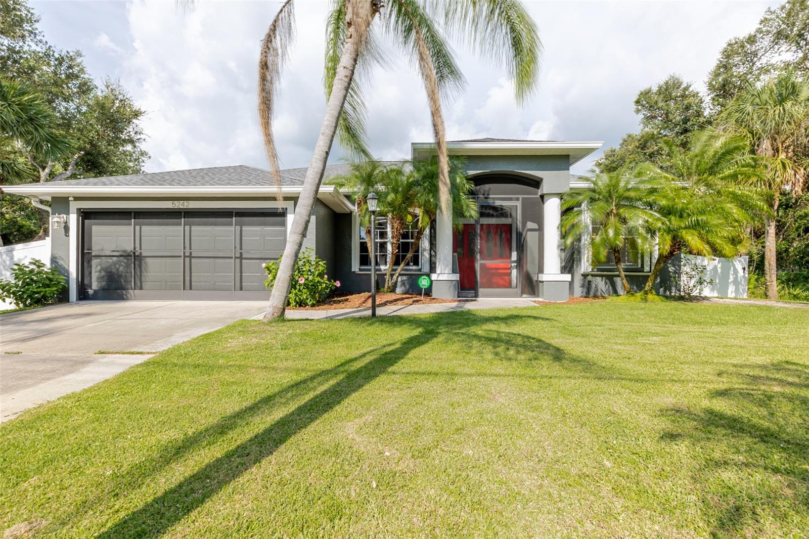 Don't miss out on this incredible value! This beautiful home offers a fantastic opportunity for a quick and smooth closing. We have partnered with our preferred lender, Phoenix Loan Solutions to offer a 1% credit towards the buyer's closing costs. This can significantly reduce your out-of-pocket expenses at closing. With a move-in ready status and this incredible incentive, the sellers are ready to consider all reasonable offers. Contact us today to schedule a showing and learn more about this exclusive offer!"
Updates Galore!!! This spacious 3-bedroom, 2-bathroom pool home is meticulously maintained, super clean, and bathed in natural light. Recently refreshed with new exterior paint, its curb appeal is undeniable.
Step inside through double front doors to an open living/dining area, seamlessly flowing into the kitchen and family room. The beautiful kitchen boasts stainless steel appliances and a high bar, perfect for entertaining. The master suite is a true retreat with two walk-in closets and direct access to the sparkling pool area. Its luxurious en-suite features a walk-in shower, jetted tub, and double sinks.
Enjoy the best of indoor-outdoor living with a spacious, covered, screened-in porch and a private pool, complete with a pool safety fence. The backyard offers enhanced privacy and charm with new vinyl fencing. Practical upgrades abound, including a new roof (July 2023), new hot water heater, whole-house water purifier, and an updated electrical panel. The septic tank was also drained in May 2024. For ultimate peace of mind, this home features permanent whole-house hurricane shutters, security window film on all glass, and a hard wired plug for the 17,500-watt whole house Generac generator. Plus, you'll love the convenience of retractable screen doors for both the garage and side entry, allowing for a refreshing breeze!
Inside, find elegant ceramic tile floors in living areas and warm hardwood in the bedrooms. The dedicated laundry room includes a newer washer and dryer. This home offers ultimate freedom with no HOA, no deed restrictions, and no flood zone designation. Situated in a quiet, secluded North Port neighborhood, you're minutes from shopping, schools, restaurants, and highways, with the Gulf beaches just a short 20-30 minute drive away. North Port, in Sarasota County, provides abundant parks, recreational facilities, and freshwater canals. This exceptional home truly offers unparalleled value – a must-see!
***VIRTUAL TOUR CLICK HERE*** https://iplayerhd.com/player/video/fcd48af5-1d4b-4263-8297-12c25d1144b7/share