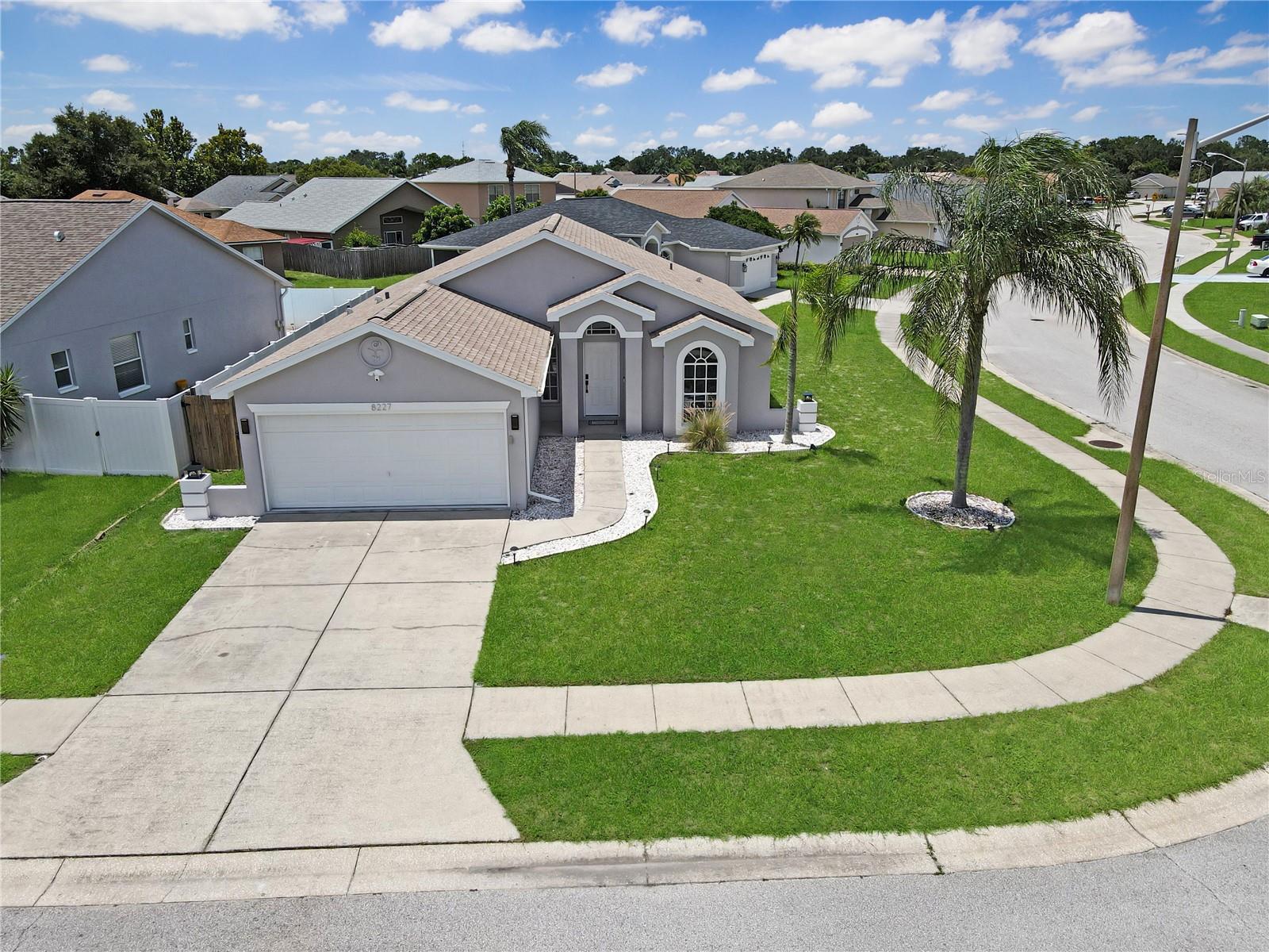 OWNER MOTIVATED!!! MODERN Florida Living in this STYLISH, SMART & FULLY RENOVATED 3-BEDROOM, 2-BATH HOME nestled in a PEACEFUL, FAMILY-FRIENDLY NEIGHBORHOOD! This beautifully updated property offers an OPEN-CONCEPT FLOOR PLAN with SUSTAINABLE BAMBOO FLOORING, and CONTEMPORARY ARTIKA INDOOR & OUTDOOR LED LIGHTING, known for its energy efficiency and long-lasting performance.
Step into the GOURMET KITCHEN, a true showstopper featuring SPARKLING QUARTZ COUNTERTOPS, BRAND-NEW modern cabinetry, a PULL-DOWN SPRAYER FAUCET, and NEW APPLIANCES all combining style and functionality to make cooking a delight.
The SPACIOUS PRIMARY SUITE includes a LARGE walk-in closet, while both bathrooms have been fully renovated with POLISHED PORCELAIN TILE, floating vanities, and LUXURY MULTIFUNCTION SHOWER SYSTEMS with rainfall heads, body JETS and handheld sprayers. The spa-like design is completed with NEW COMPACT DUAL-FLUSH TOILETS, offering sleek aesthetics and water savings.
This SMART HOME features KWIKSET SMART LOCKS on both the front door and garage (control via keypad or phone), REMOTE-CONTROLLED CEILING FANS WITH WALNUT BLADES (Alexa/Google/TUYA app compatible), and a RING DOORBELL + OUTDOOR CAMERA SYSTEM for added security. A FULL SPRINKLER SYSTEM is also included for easy maintenance.
Relax outdoors on the SCREENED-IN COVERED PORCH with NEW ceramic tile flooring and Remote ceiling fan the perfect spot for morning coffee or evening gatherings. Enjoy the LARGE, PRIVATE BACKYARD ideal for entertaining, pets, or playtime. ROOF IS ONLY 3 YEARS OLD, providing extra value and peace of mind.
Community features include a CLUBHOUSE WITH POOL, FISHING LAKE, and RARE DRY STORAGE FOR RVs & BOATS all for a LOW HOA.
MOVE-IN READY, ENERGY-EFFICIENT, AND BEAUTIFULLY DESIGNED just 2 MIN TO PUBLIX, MIN TO LIBRARY, SHOPS, AND BEACHES, and BEST OF ALL — NOT IN A FLOOD ZONE!