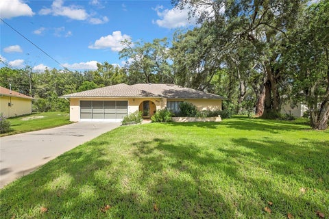 Photo of 5517 Piedmont Drive, Spring Hill, FL 34606 (MLS # W7890265)