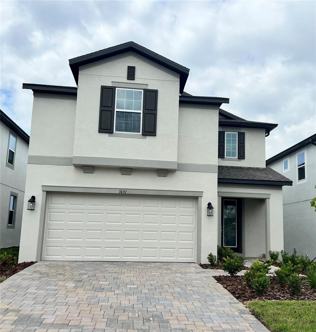 Photo of 7491 NOTCHED PINE BEND, WESLEY CHAPEL, FL 33545 (MLS # J966987)