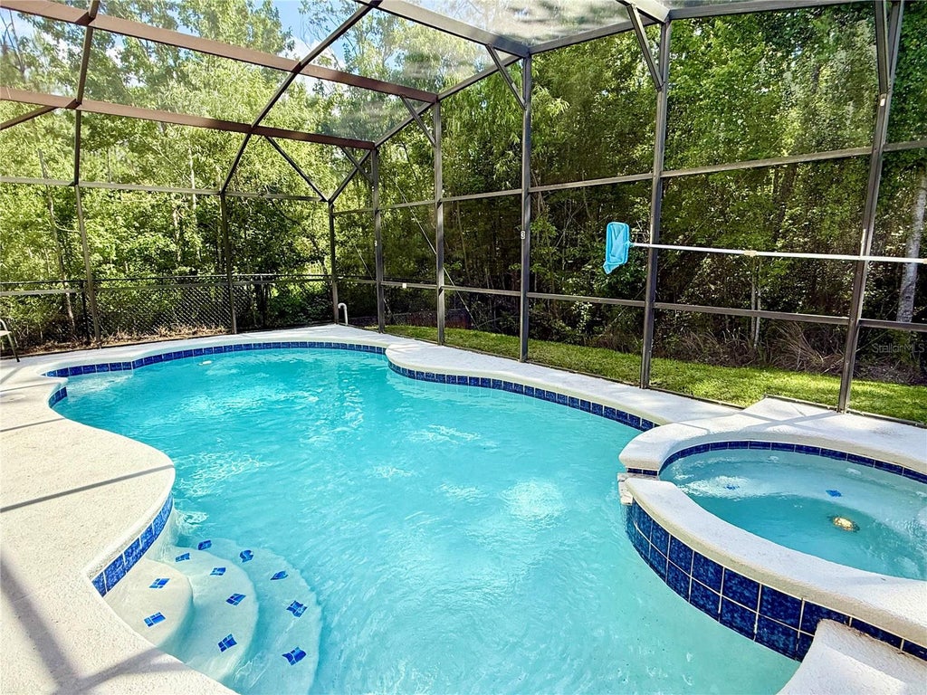 Photo of 403 Sandy Ridge Drive, Davenport, FL 33896 (MLS # S5159225)