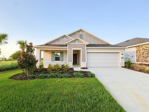 Photo of 187 Puma Loop, Groveland, FL 34736 (MLS # O6417097)