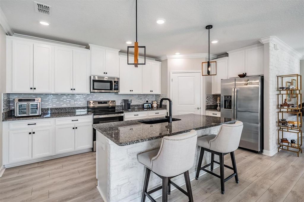 Photo of 10444 Weldon Cork Way, San Antonio, FL 33576 (MLS # TB8461662)