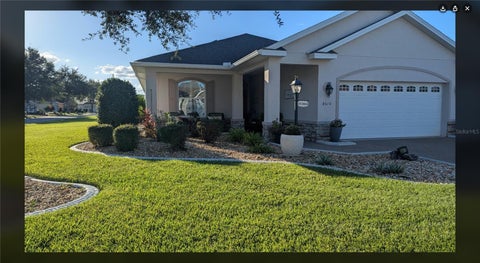 Photo of 8610 SW 88th Loop, Ocala, FL 34481 (MLS # OM734487)