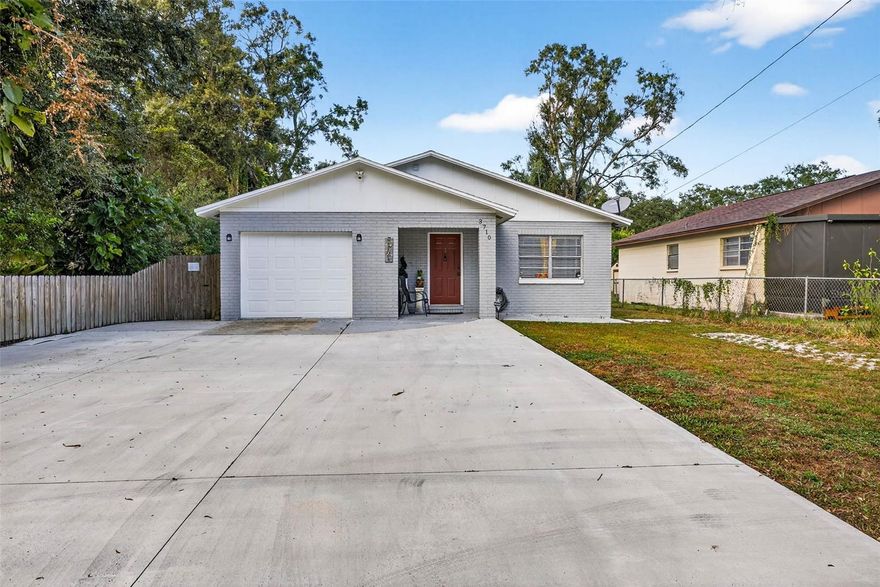 Experience the perfect blend of modern comfort and flexible living in this beautifully updated 3-bedroom, 2-bath home — plus a private 1-bedroom, 1-bath studio!
NO HOA AND NO CDD TAX.
Step inside to discover elegant tile flooring throughout, creating a clean and contemporary feel. The bright and open living room flows seamlessly into the stylish kitchen, featuring a granite breakfast bar, brand-new stainless steel appliances, and a convenient wine fridge — perfect for casual dining or entertaining guests.

The spacious primary suite offers an updated ensuite bathroom with a shower-tub combo, while two additional bedrooms share a second full bath. One of the bedrooms includes French doors leading to the large screened-in porch — the perfect place to relax and enjoy Florida’s indoor-outdoor lifestyle.

The garage has been thoughtfully converted into a private 1-bedroom, 1-bath studio suite with its own separate entrance — ideal as an in-law suite, guest quarters, or income-producing rental.

Outside, unwind or entertain in the backyard retreat featuring a screened-in patio, a large concrete deck, low-maintenance artificial turf, an inviting above-ground pool, and a spacious custom-built deck perfect for gatherings. Two sheds with electrical provide extra storage and workspace, and the oversized driveway offers plenty of parking for residents and guests.

Peace of mind comes with a new roof (2019) and new A/C (2019). Conveniently located less than 30 minutes from Downtown Tampa, 15 minutes from USF, and just 10 minutes from Busch Gardens, this home provides easy access to top entertainment, education, shopping, and dining options.

Don’t miss your chance to own this versatile, move-in-ready home in a prime location!
