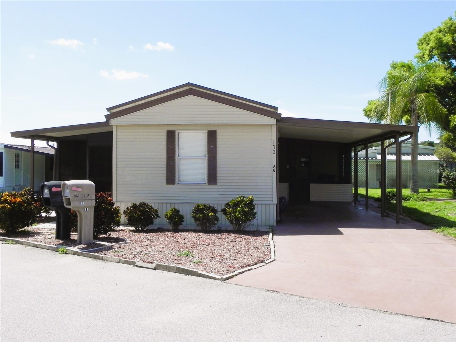 Welcome to wonderful Twin Fountains! This 55+ community is located in rural Lake Wales but just minutes to the Town of Dundee or downtown Lake Wales. 132 Orangewood Dr is a 2br/2ba home with an inside laundry. There are two entrances to the home. There is a ramp located to the left of the home within a covered screened room with vinyl windows or to the right of the home with the carport are stairs. All furnishings remain! The primary bedroom has a walk-in closet and an additional linen closet within the en suite bathroom. There is a large tub with shower and one sink. The kitchen has both a breakfast bar that keeps the space open into the living room plus a dinette area. The additional bedroom and guest bath are on the other side of the living room. This great home has a total of 3 screened rooms for a lot of outdoor relaxing opportunities and 2 storage sheds (one with a washtub) for additional space. Twin Fountains has a monthly fee of $180 and includes cable, internet, water, sewer, lawn maintenance and the use of the community pool, clubhouse and shuffleboard courts.